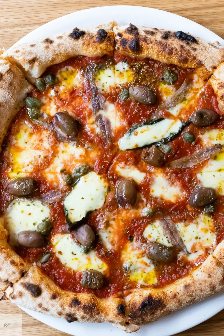 Rotonda Pizza Mediterranean — wood-fired Neapolitan pizza with Kalamata olives, capers, anchovies and fior di latte on San Marzano base, Sydney catering events