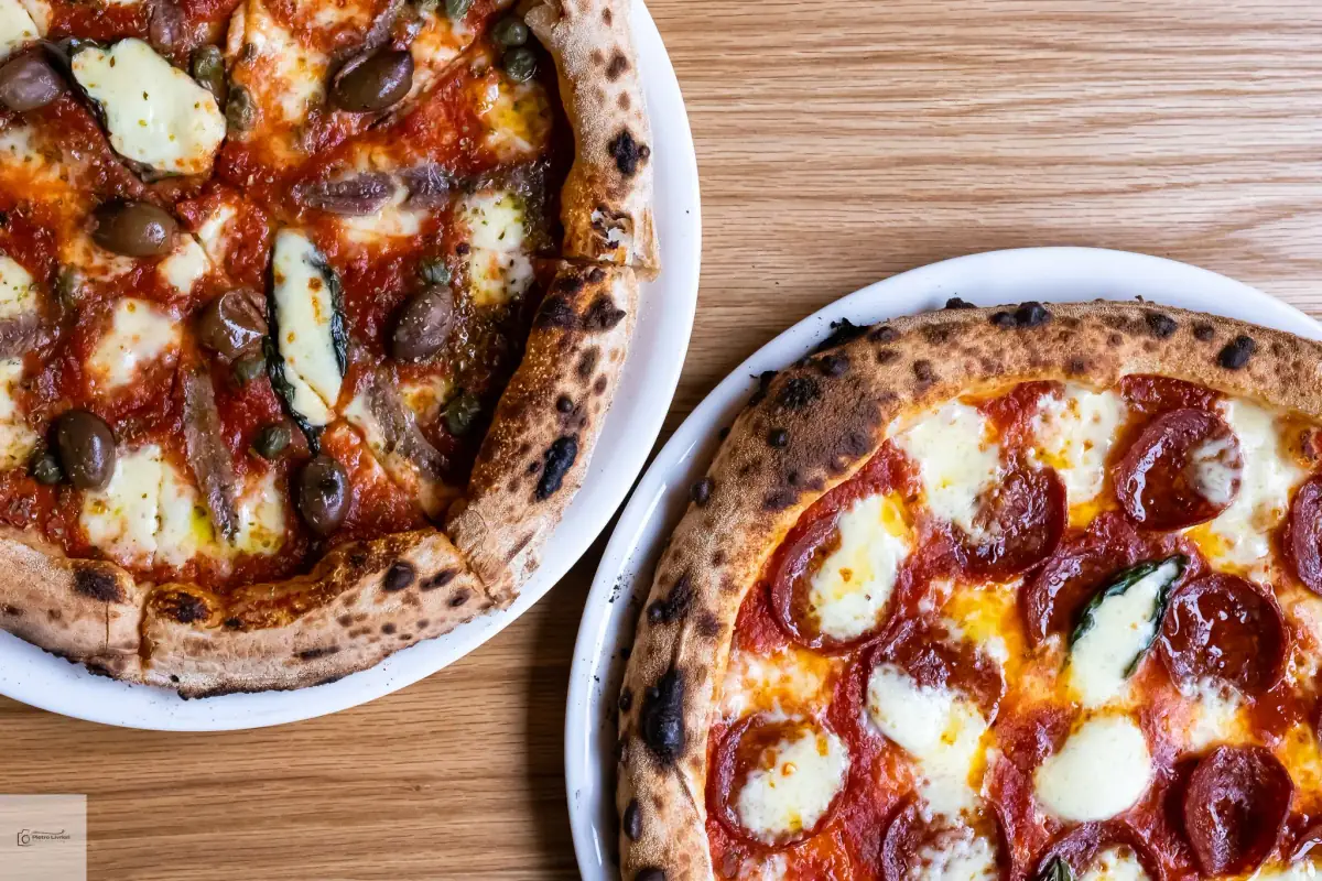 Two authentic wood-fired Neapolitan pizzas at a Rotonda Pizza corporate catering event in Sydney