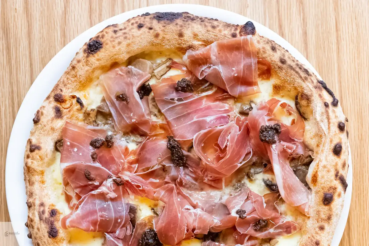 Rotonda Pizza prosciutto crudo e tartufo — premium white base pizza with San Daniele prosciutto and shaved black truffle, Sydney events